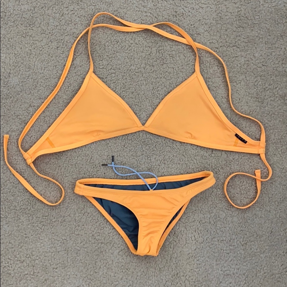 jolyn clothing triangle top and European bottom